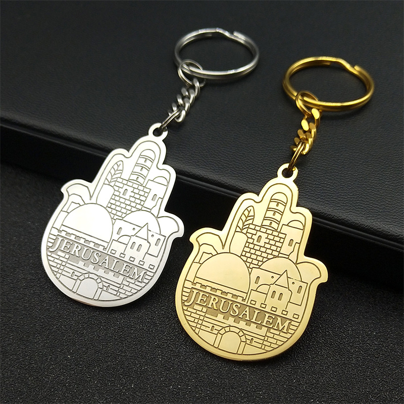 Porte-clés argenté avec main Hamsa et paysage de Jérusalem