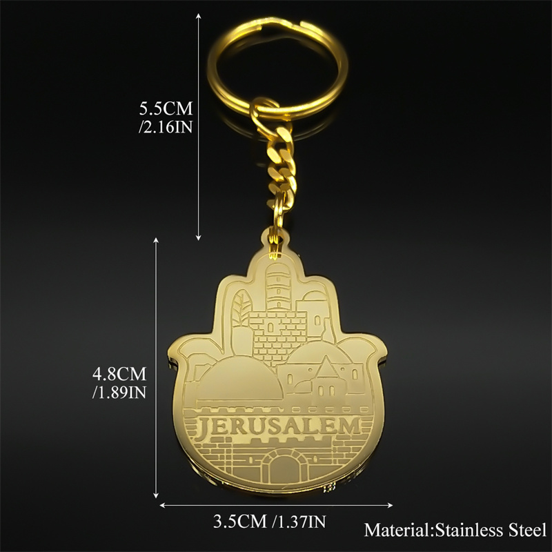 Porte-clés doré en acier inoxydable, forme Hamsa avec décor de Jérusalem gravé.