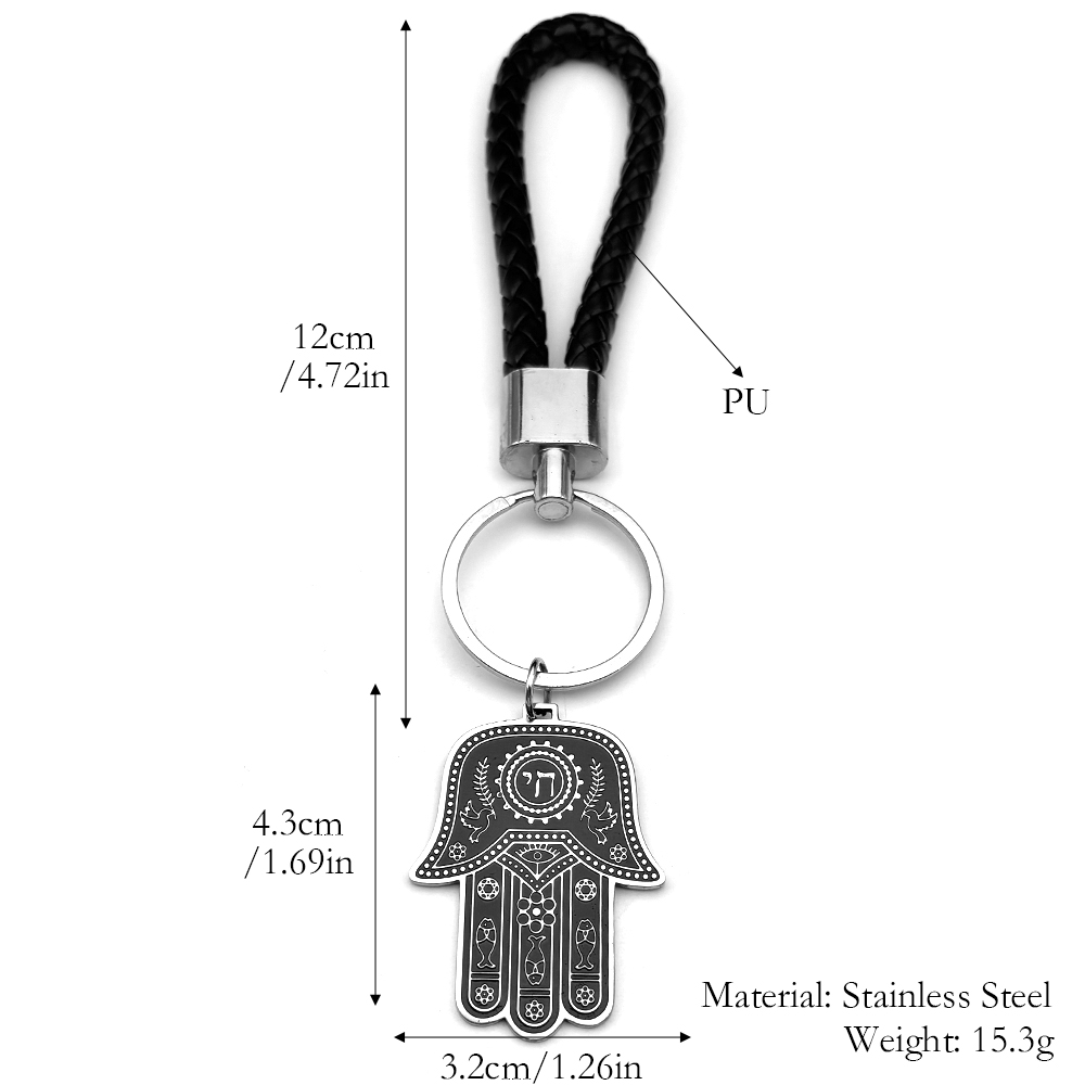 Porte-clés Hamsa en acier inoxydable avec cordon noir tressé et détails hébraïques.