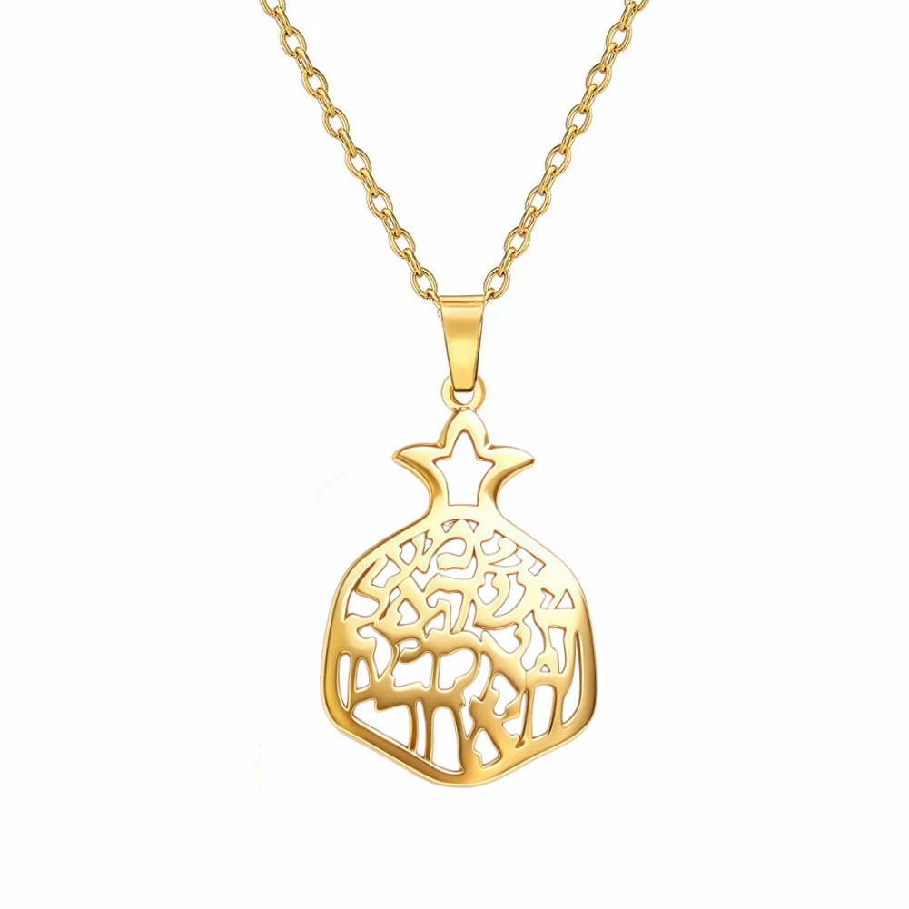 Détail du pendentif grenade doré et de son arbre de vie