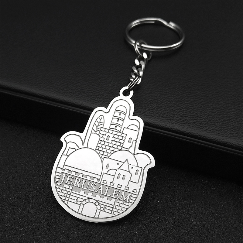 Porte-clés argenté avec main Hamsa et paysage de Jérusalem